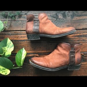 Cognac leather booties.